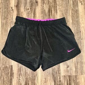 Nike Women's Black Athletic Shorts with Purple Logo